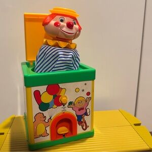 VINTAGE jack in the box toy. awful clown.